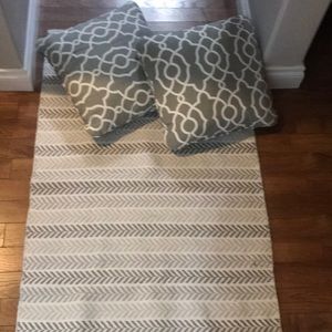 Throw rug and pillows